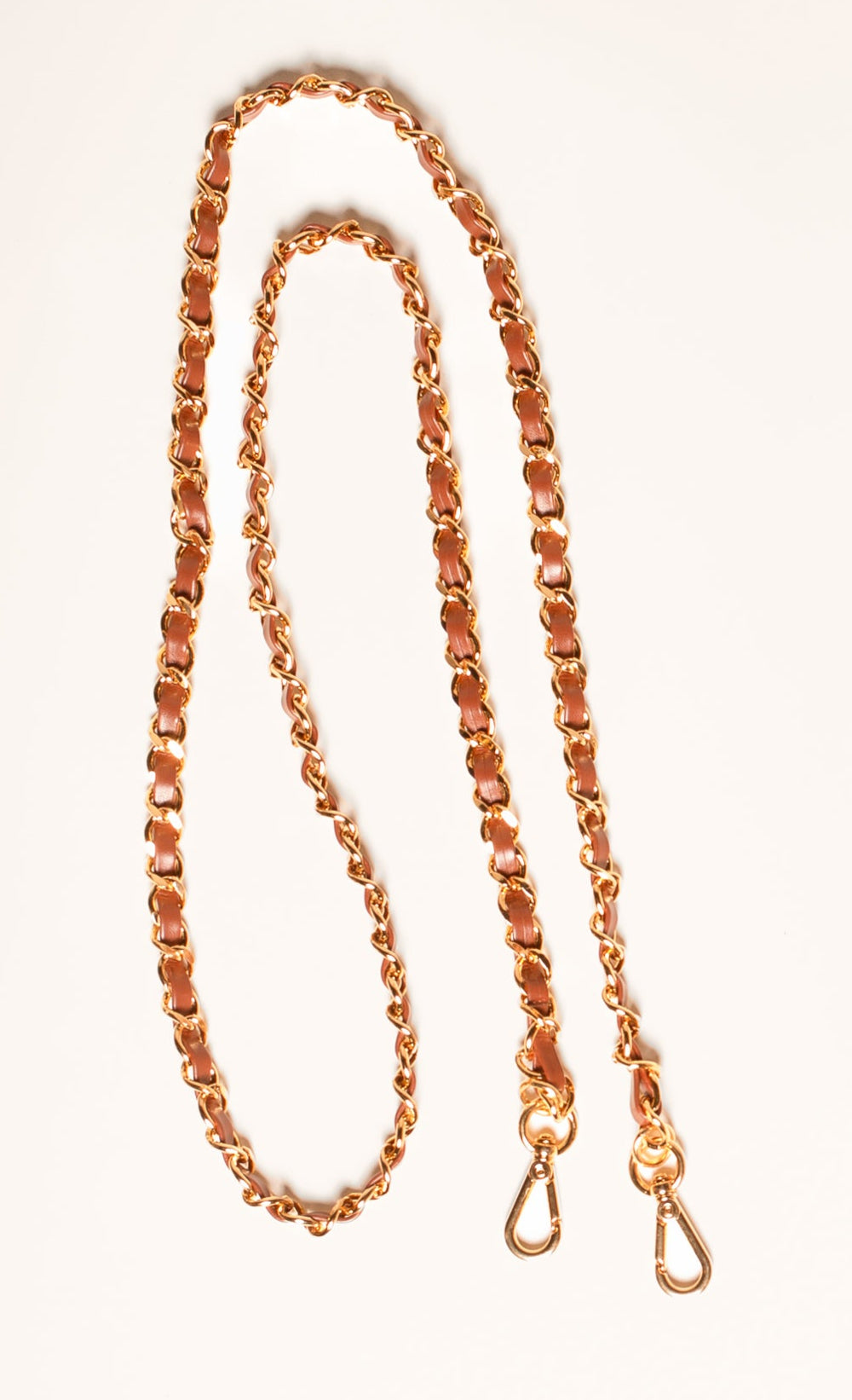 Alça de corrente dourada e courino